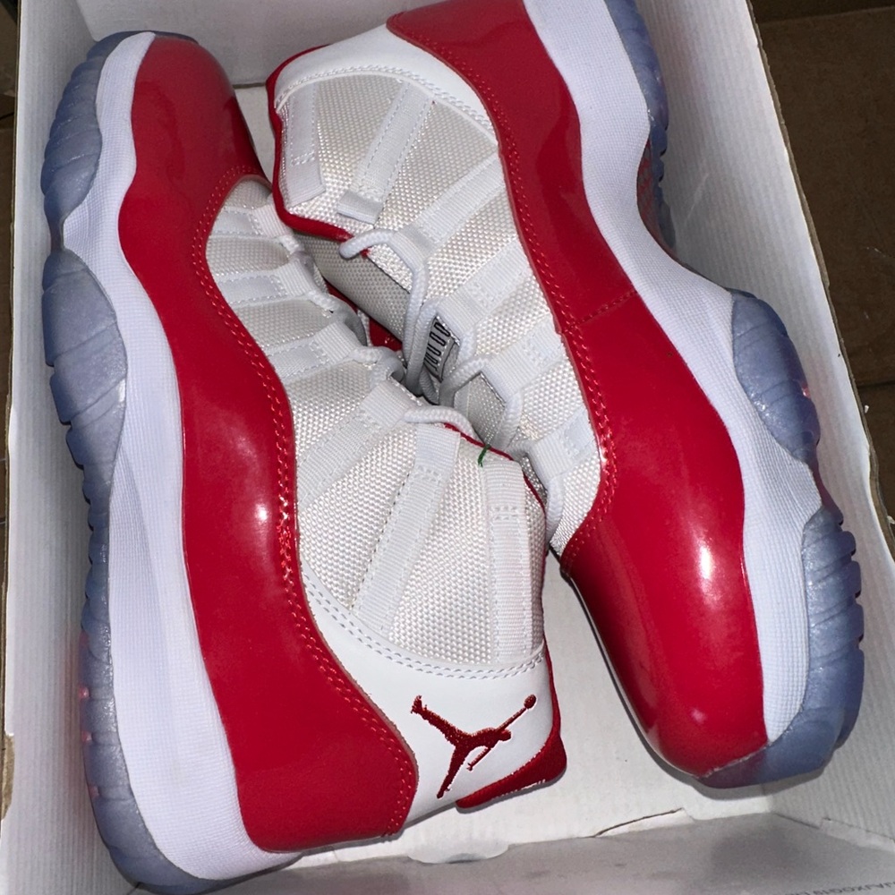 Jordan 11 Red and White Athletic Shoes